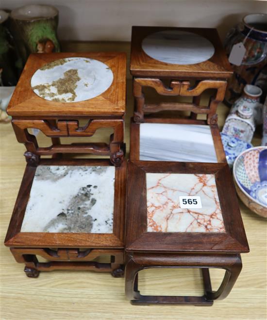 A pair of Chinese hardwood two tier vase stands, width 17cm, depth 17cm, height 21cm